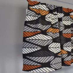 Arvidssons textil Gardinkappor Mönstrade|Blader svart-orange gardinkappa metervara