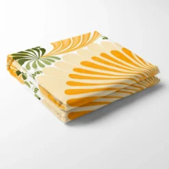 Arvidssons textil Arvidssons Textil|Lisette gul tyg - livfullt tryck med grafisk 70-talskänsla